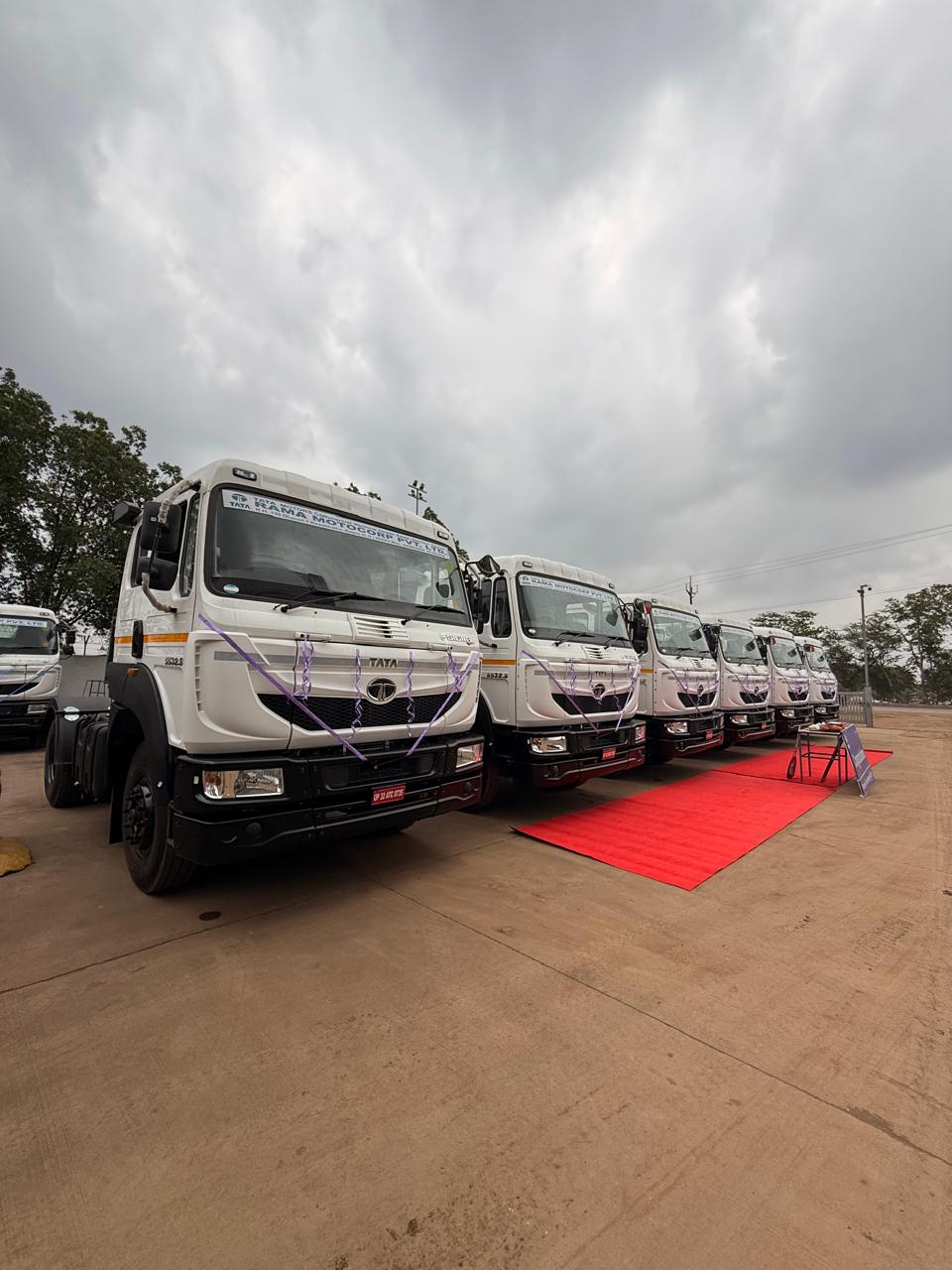 Row of Universal Road Carrier trucks at the Bhilai transport yard