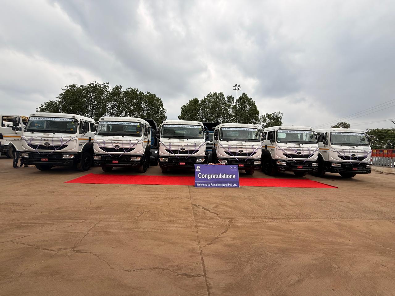 Fleet of heavy vehicles parked in a row